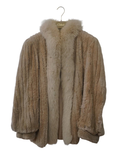 A vintage 1980s Chloé fox trim coat in a warm beige tone