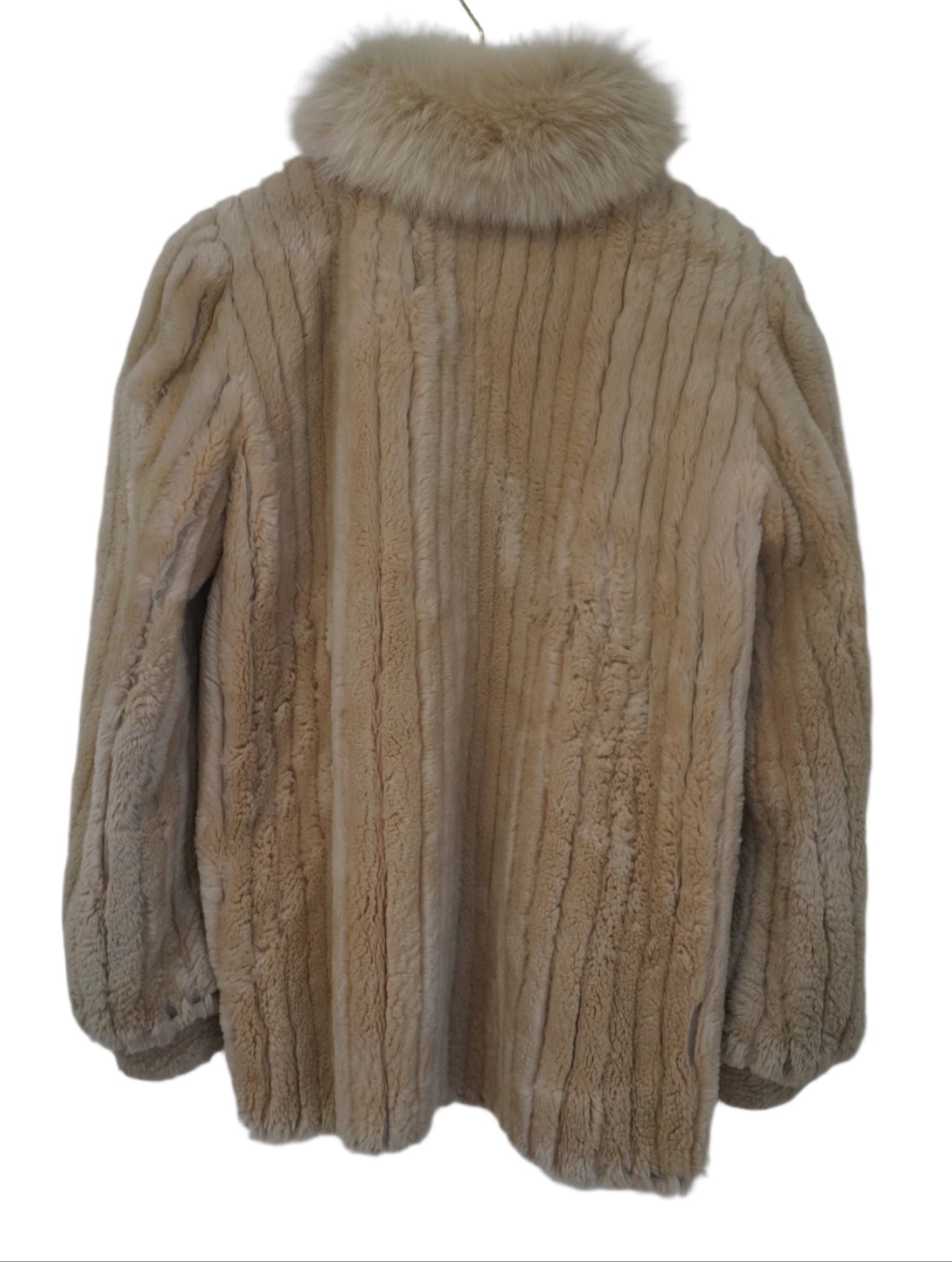  showcasing its plush fox fur collar and trim