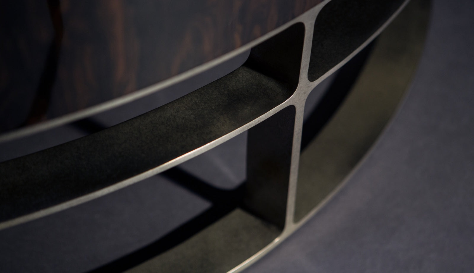 Close up of metal base of custom made kinetic art coffee table