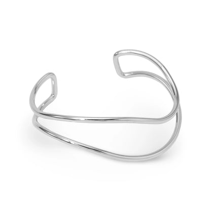 A polished open cuff bangle with a modern